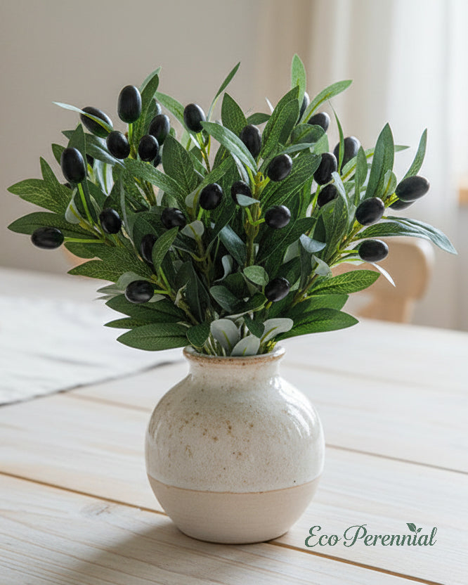 Artificial olive branches in white ceramic vase centerpiece by Eco Perennial