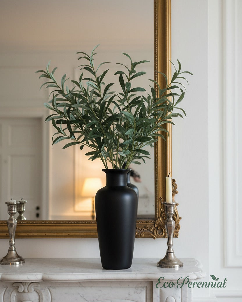 Eco Perennial large faux olive branches overflowing a stone urn for grand farmhouse entryway styling