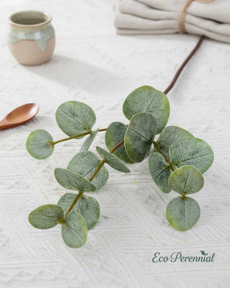 Faux eucalyptus branches arranged in a vase - Eco Perennial