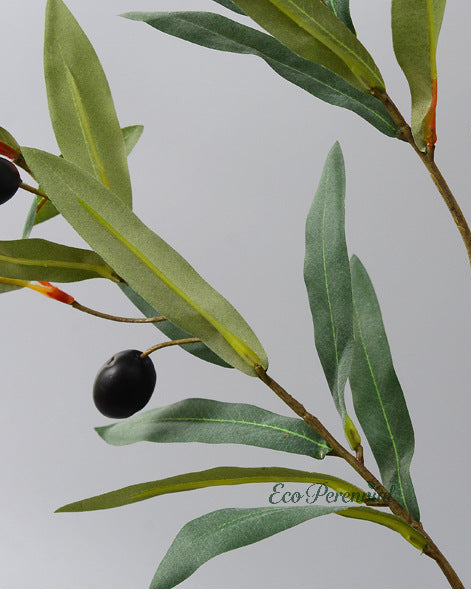Full faux olive greenery centerpiece on dining table by Eco Perennial