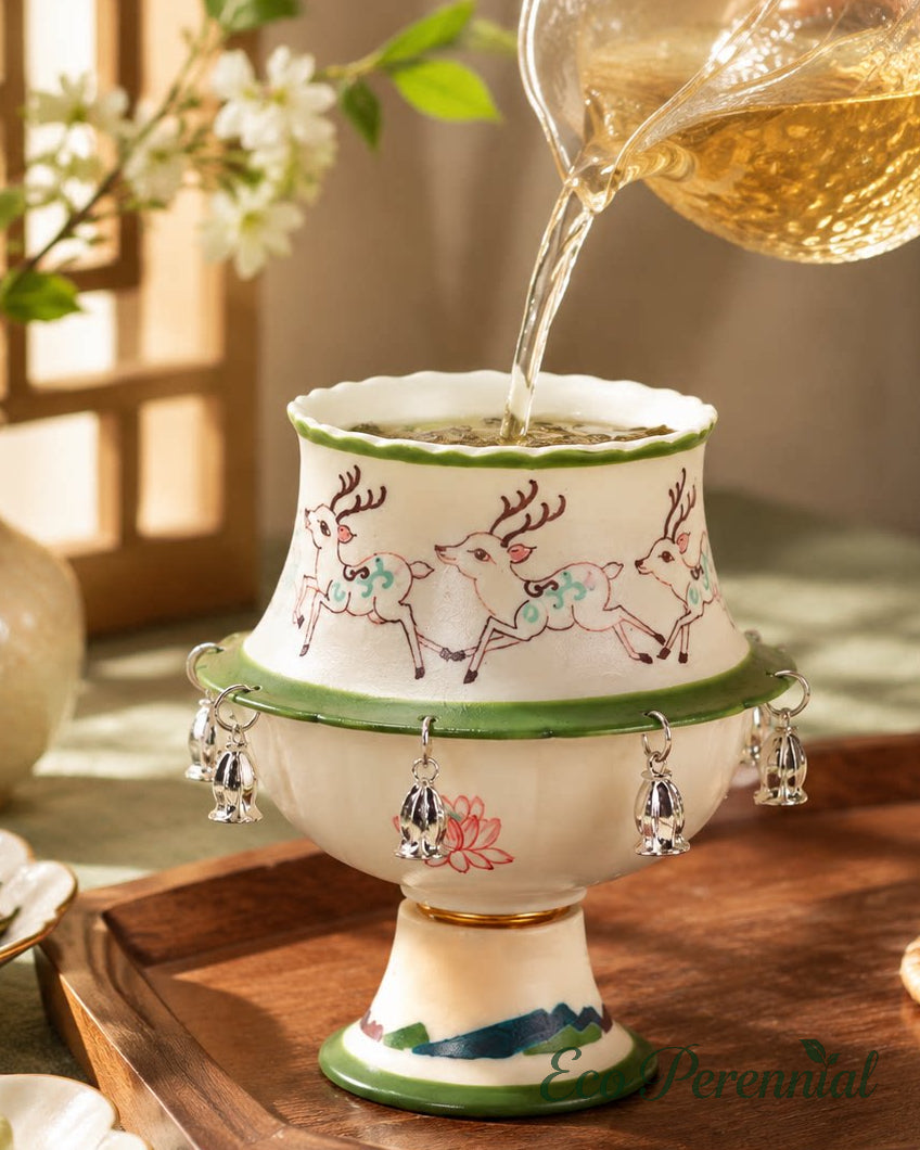 Interactive rotating teacup featuring cottagecore woodland deer motif
