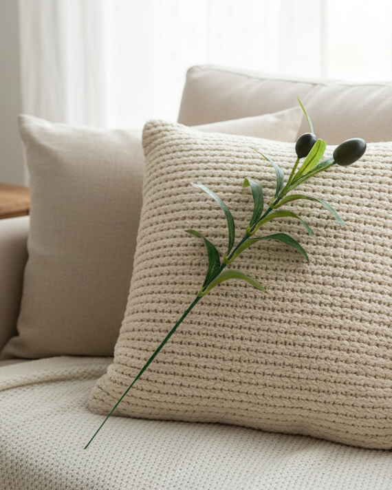 Realistic artificial olive stems arranged in ceramic vase by Eco Perennial
