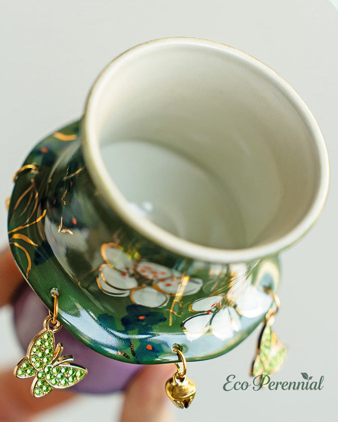 Small jasmine ceramic gongfu teacup held in hand — Eco Perennial