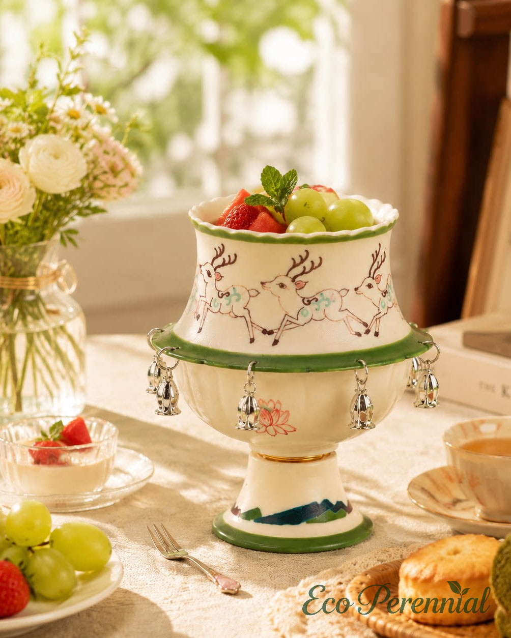 Spinning ceramic teacup with scalloped green rim and silver bell charms