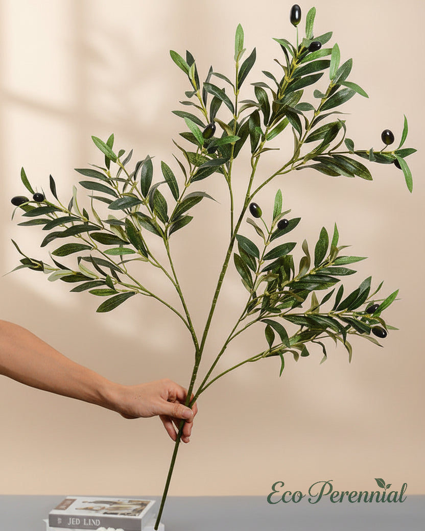 Tall faux olive branch against warm beige textured background