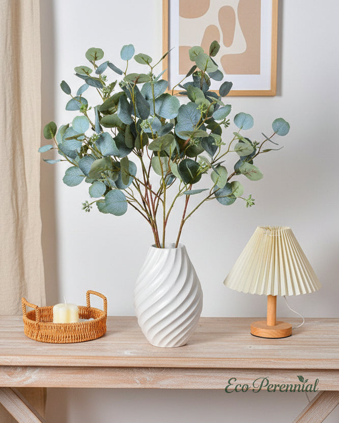 Three sage green artificial eucalyptus branches creating a balanced look - Eco Perennial