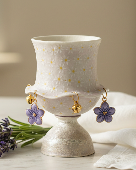 Lavender daisy hand-painted ceramic tea cup with ruffled rim and gold bell charms — Eco Perennial